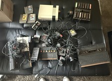 Atari And NES With Games And Controllers