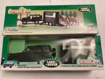 New Ray Land Rover Discovery im Maßstab 1:32 mit Pferdebox s und Pferd