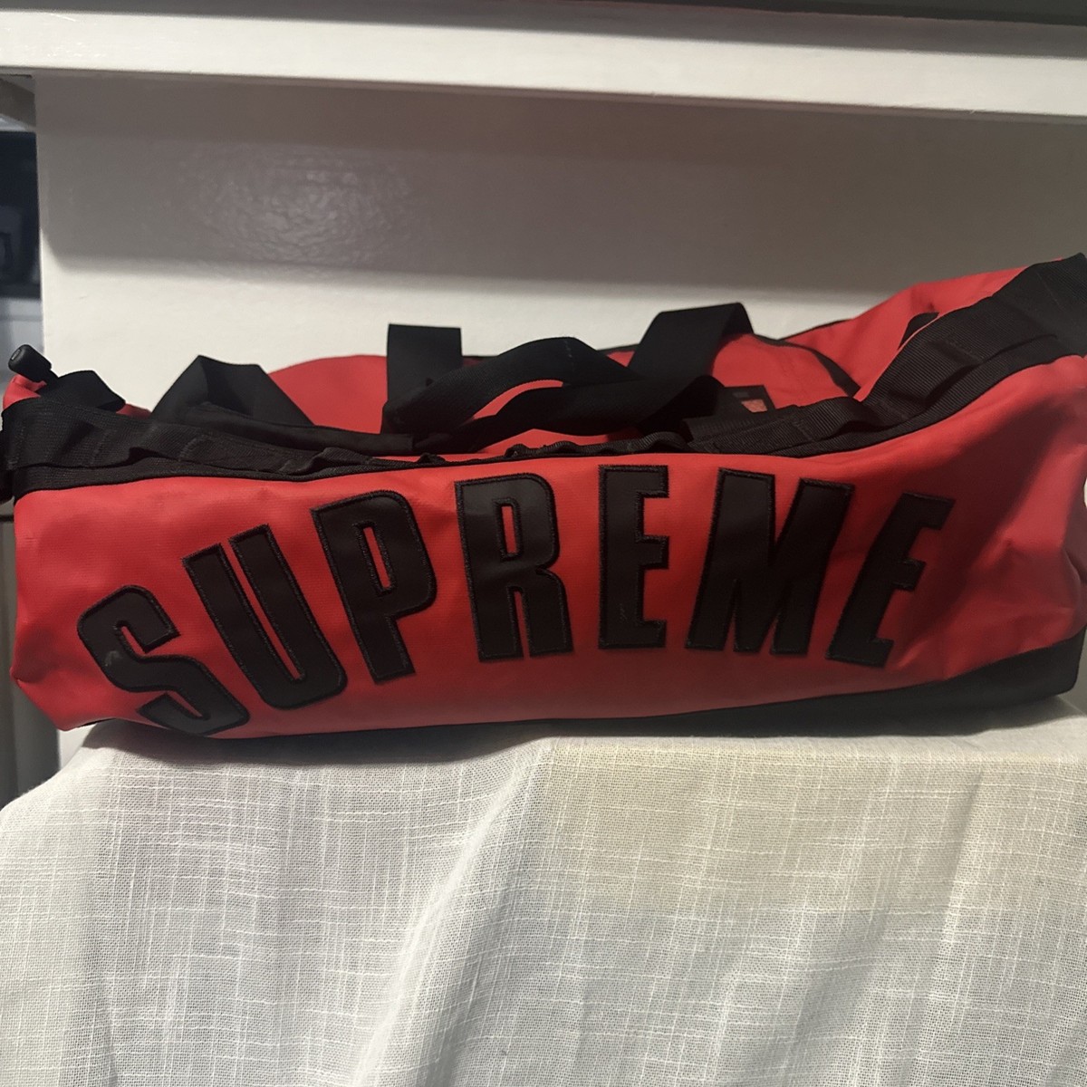 Supreme® The North Face® Arc Logo Base Camp Duffle Bag Red Supreme® The North Face® Arc Logo Base Camp Duffle Bag Red