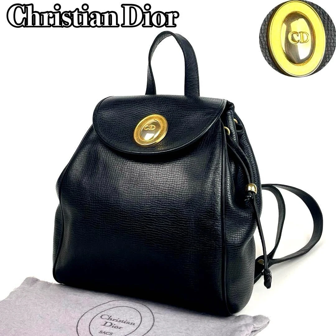 Sac à dos Dior CD Gold Hardware ovale cordon cuir noir en bon état