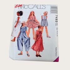 Vintage 1990s McCalls Sewing Pattern 7493 Girls Dress and Jumpsuit Size 10-14