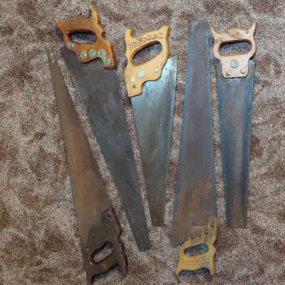 Lot of 5 vintage Diston and Warranted Superior wood handled saws