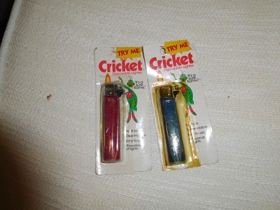 LOT VINTAGE 1980S CRICKET LIGHTERS IN PACKAGE RED AND BLUE