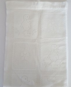 white cotton baby blanket