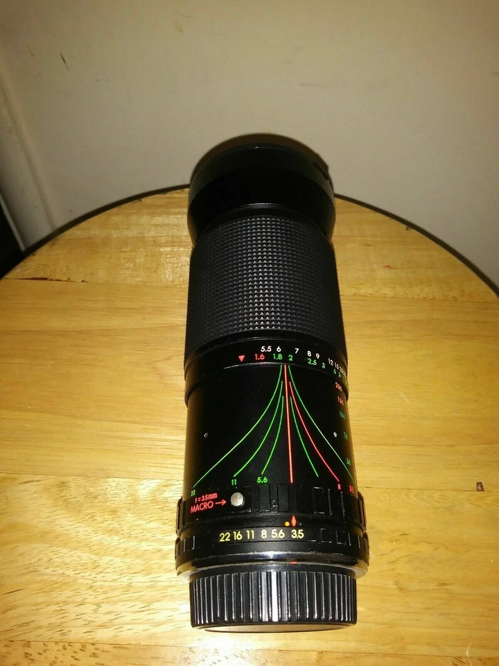 Lente zoom cámara automática Sakar MC macro 1:3,5-4,8 f=35-200 mm telescopio binoculares Foto 2 de 4