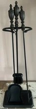 4 Piece Cast Iron Fireplace Tool Set W/ Flame Logo On Base