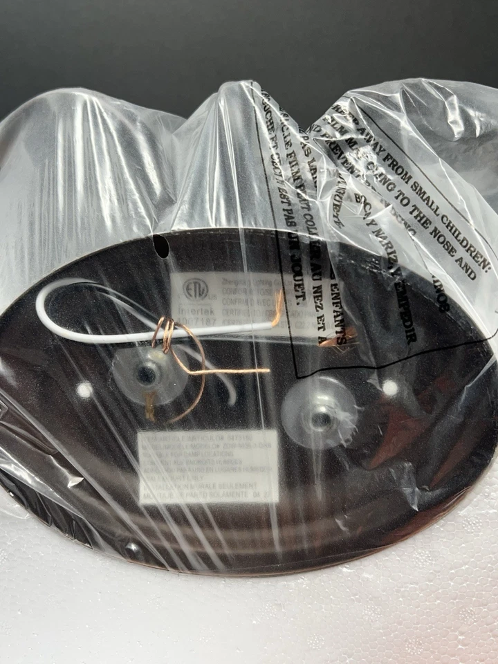 Barra de tocador de 3 luces allen + roth 22,83 x 9,01 x 9,45 con acabado bronce frotado con aceite. Foto 3 de 4