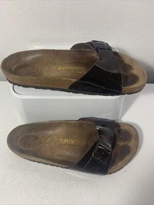 BIRKENSTOCKS dunkelbraunes Lackleder. Verstellbar. Größe EU38 UK5