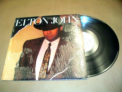 VINYL ALBUM RECORD,ELTON JOHN BREAKING HEARTS,SLOW DOWN GEORGIE,WHO WEARS THESE