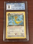 Error (ink error) non holo 1st ed. dragonite CGC 8