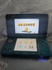 3DS aqua Blue. No Charger. Plastic Screen Protectors Still Intact. Read Descript