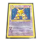 1999 Pokemon Base Set 1st Edition Shadowless Grey Stamp Alakazam Holo Rare 1/102