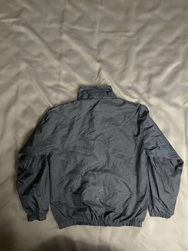 Chaqueta cortavientos con cremallera repelente al agua Pro Spirit de colección para hombre azul oscuro pequeña Foto 2 de 4