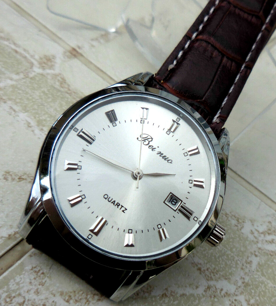 Montre Bei-Nuo classique mixte avec date et bracelet noir en tres bon etat