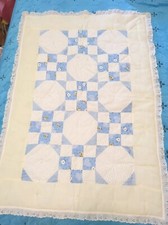 Pieced baby quilt handmade 25"-37" Tied Blue and beige with blue backing Sweet