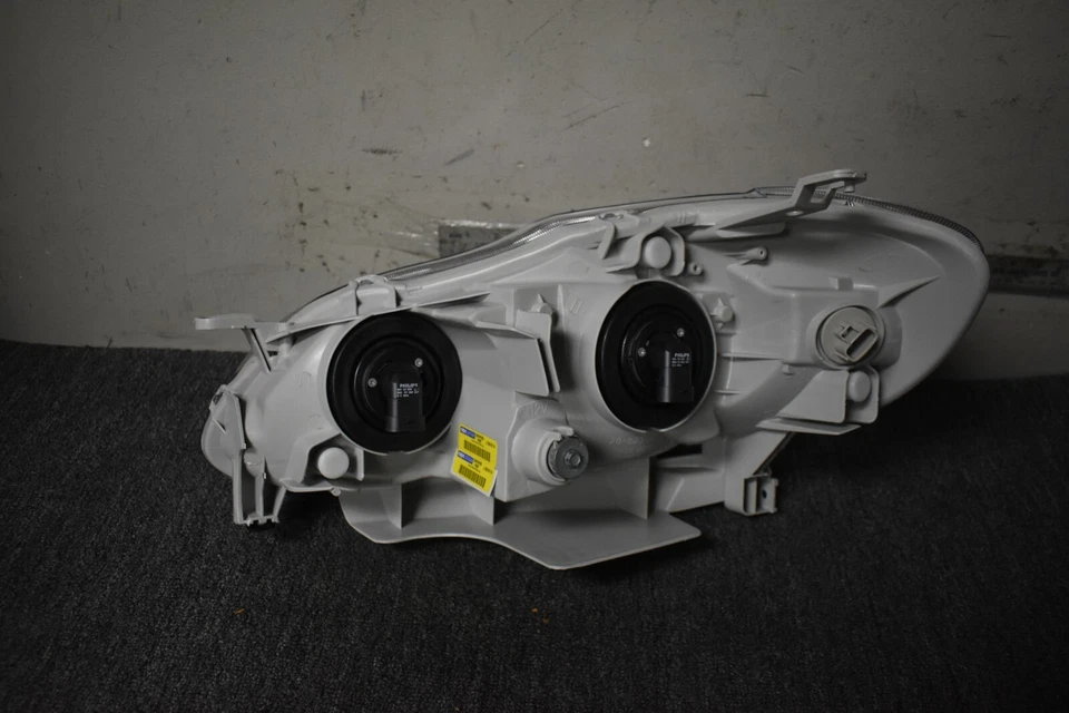 Faro derecho Toyota Corolla CE/LE 2005-2008 OEM de fábrica Foto 4 de 4