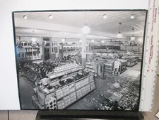 Aurora 1930s auto supply store photo bicycle RCA radio J&R oil Tiger light lens