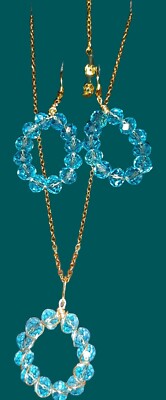  Goldene Kette mit funkelnden österreichischen Kristallglasperlen Halsketten + Ohrringe