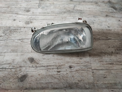 VW Golf III 1H Scheinwerfer links Hella 14487500
