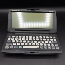 Hewlett Packard HP 320LX Palmtop PC Windows 1997 Powers On Parts