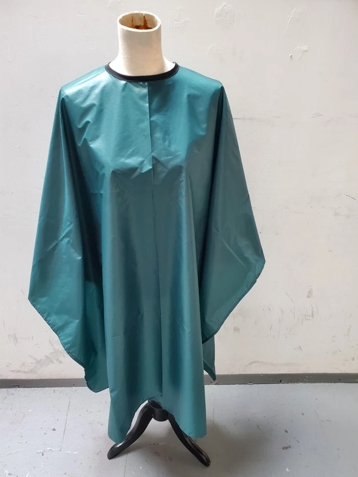 LIC SALON APPAREL INC. Forest green Chemical and Cutting cape with adjustable snap closure