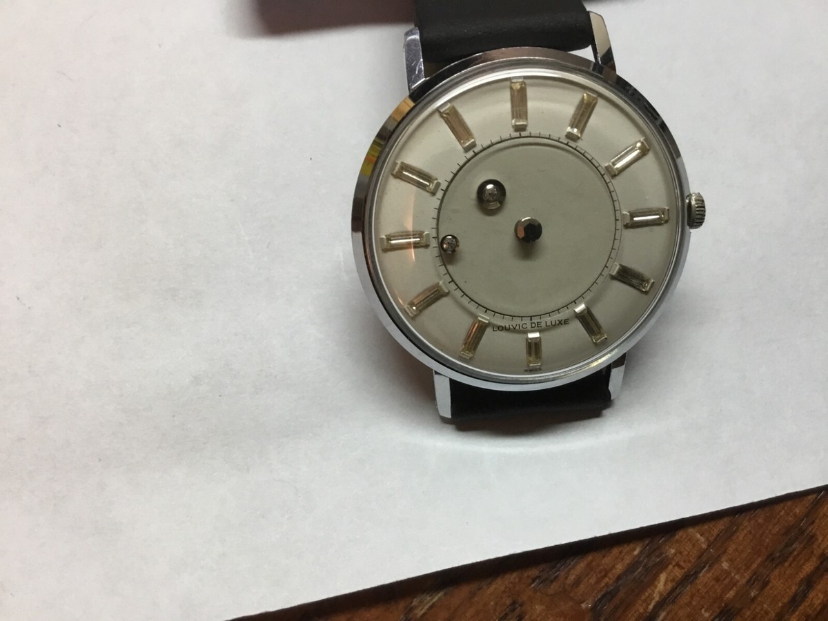 VINTAGE STAINLESS STEEL LOUVIC DE LUXE MISTERY DIAL MANUAL WINDING