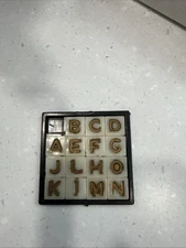 Vintage Word Puzzle Sliding Letters Toy , Hong Kong, used see pictures