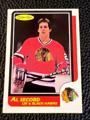 1986-87 O-Pee-Chee #100 Al Secord - Black Hawks (C)