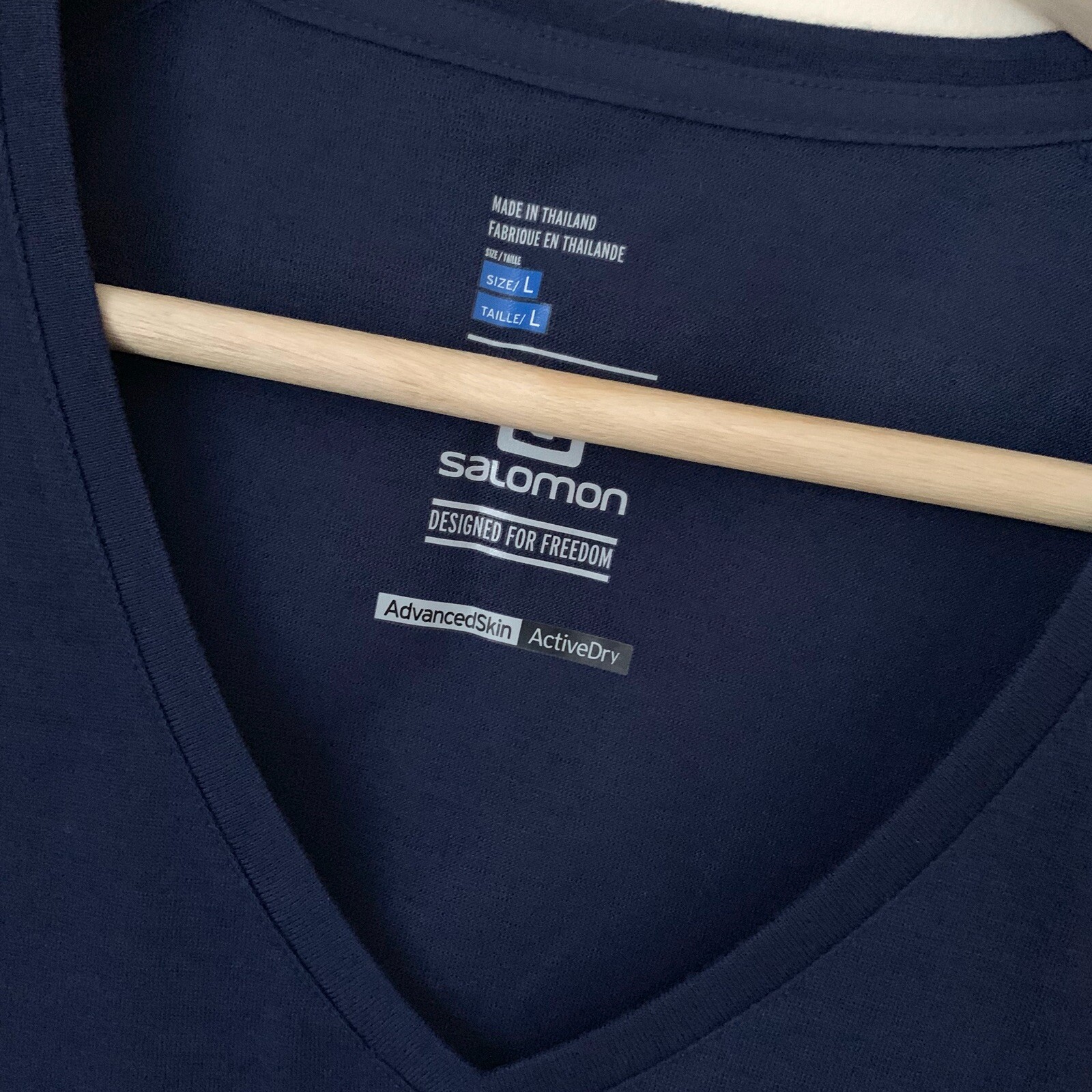 Top Salomon da donna grande manica corta collo a V navy scuro pelle avanzata attiva asciutta