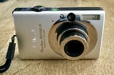 Canon PowerShot SD1100 IS Digital Elph - With Charger, Roots Case. Works Great.