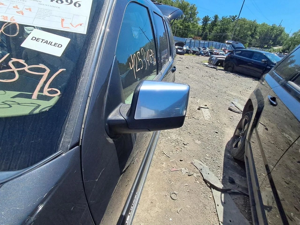 Espejo retrovisor lateral del conductor Mercury Mountaineer 2007 OEM eléctrico plegable gris 3614967 Foto 2 de 3
