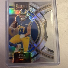 Puka Nacua RC 2023 Select Silver Prizm Premier Rookie Card #199 Die Cut LA Rams. rookie card picture