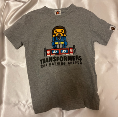 A BATHING APE / ×TRANSFORMERS/BABY MILO/Tシャツ/L/コットン/BLK/プリント// A Bathing Ape Bape kids Milo Transformer short sleeve T-shirt 120