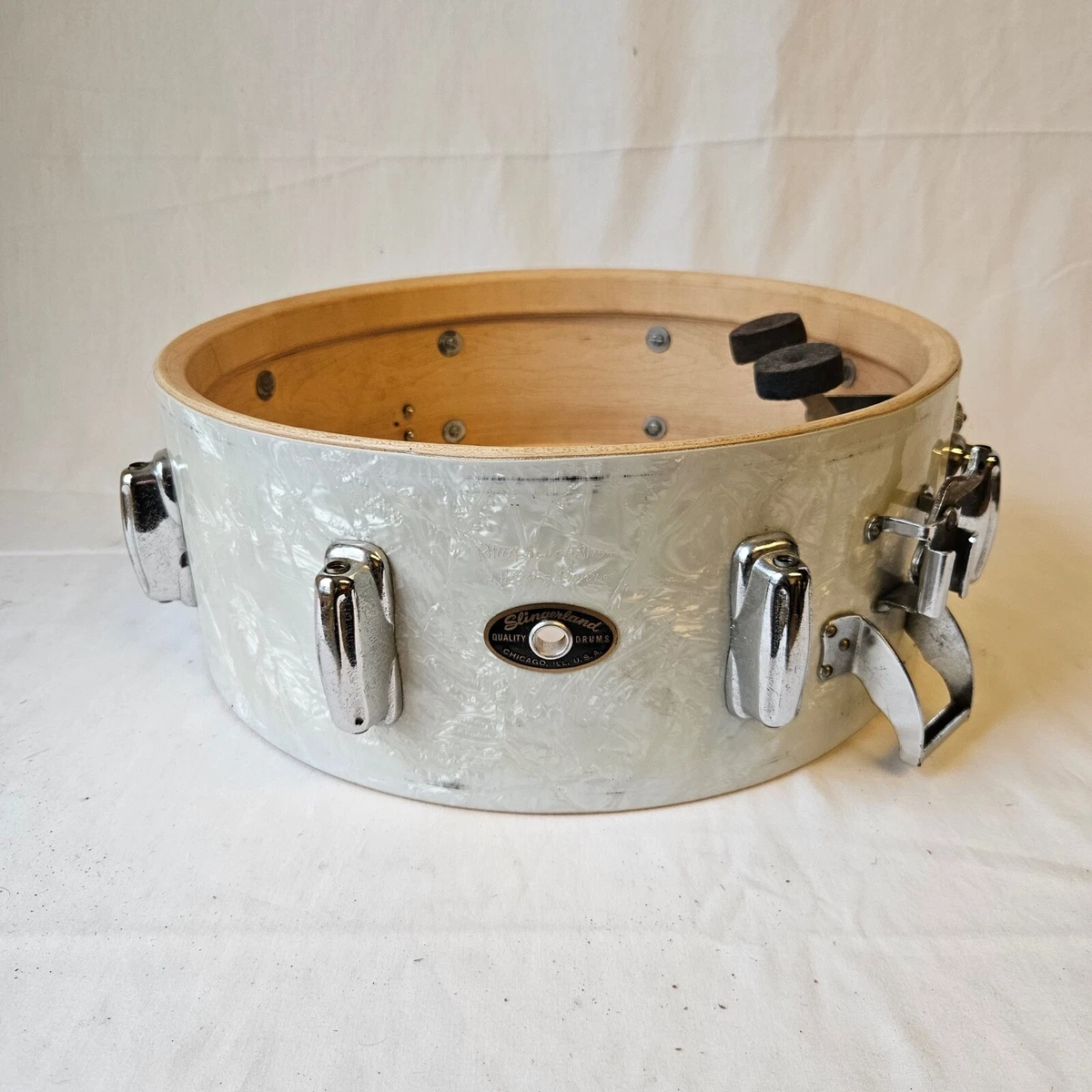 Solid outlet shell drums