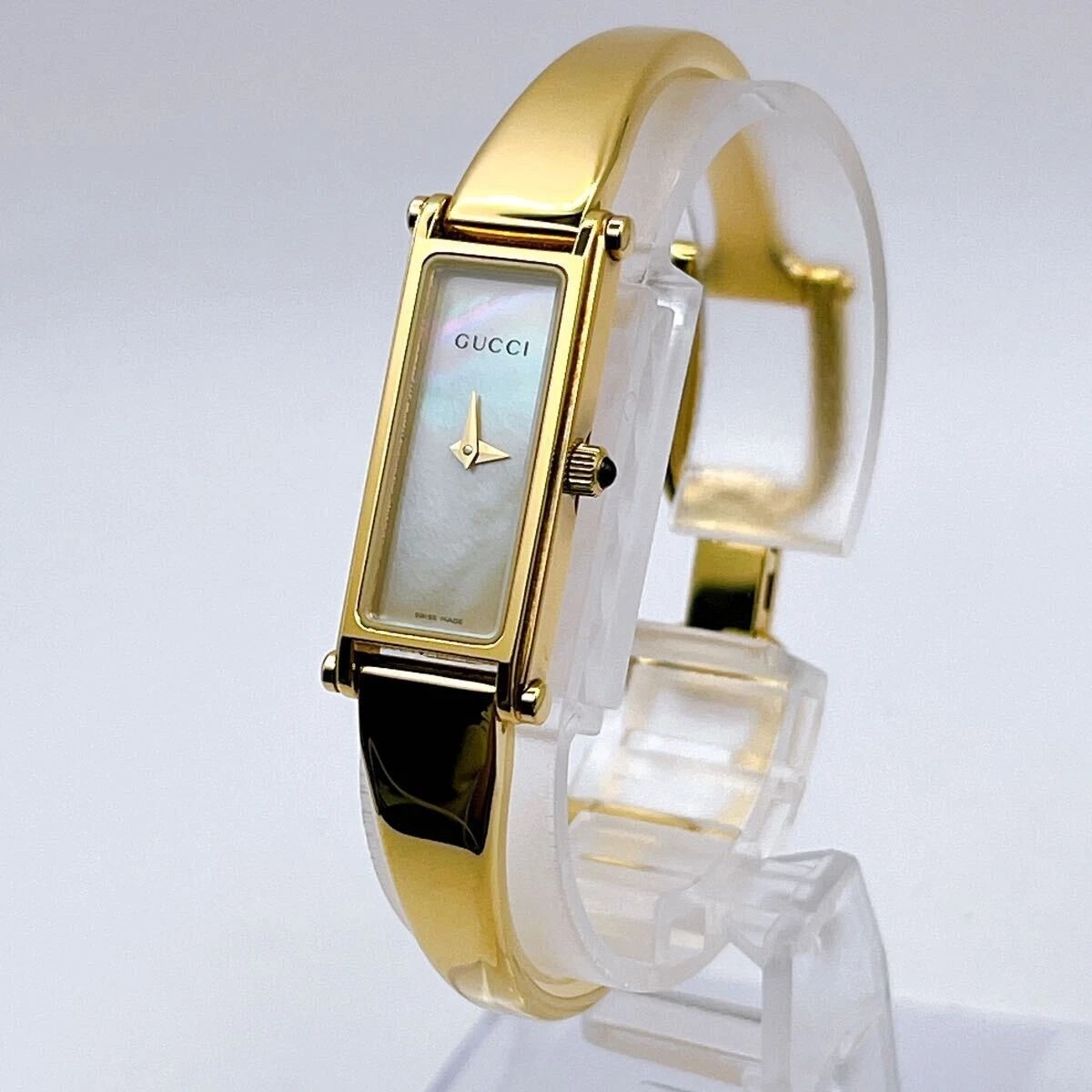 Montre GUCCI 1500L cadran carré doré coque rectangle suisse vintage