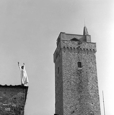 Graham Faulkner as St Francis of Assisi on a roof in a scene of Br- Old Photo
