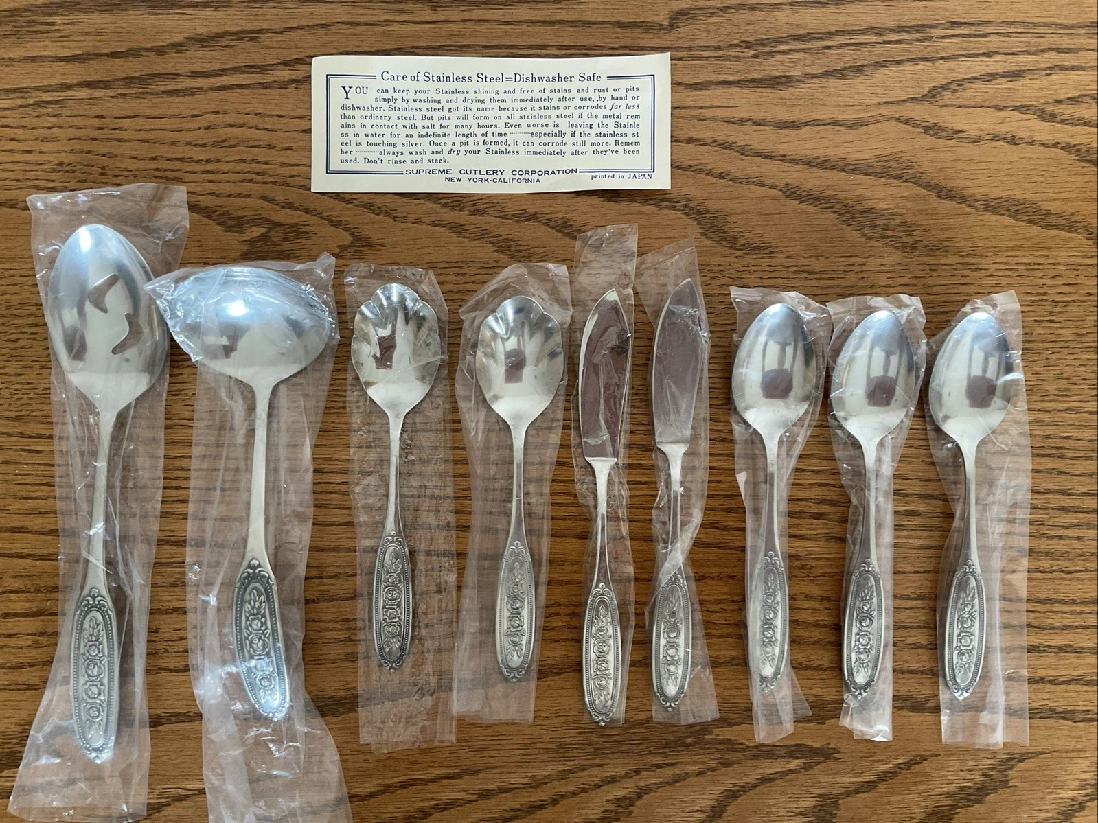 New Utensil Lot of 9 Serving Spoon, Ladel, Sugar, Knives Beaded Rose Towle?