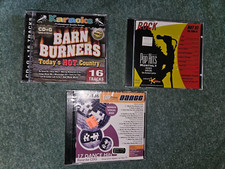 LOT 32  ALL NEW  KARAOKE 11 DISC MIXED STILL WRAPPED