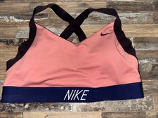 Reggiseno sportivo Nike Dri-FIT donna grande rosa corallo racerback atletico