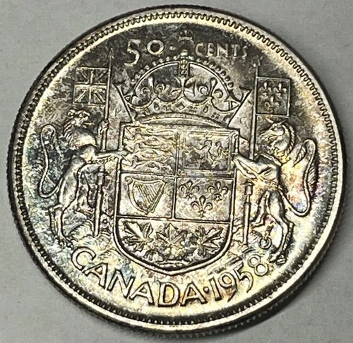 Canada 1958 50 Cents Silver Half Dollar. Beautifully Toned Original Coin.