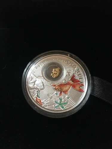 2014  Niue Islands, One Dollar "Goldfish"  14.14gr  .999 Ag Silver,