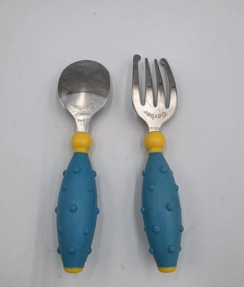 Cubiertos y cuchara de acero inoxidable con mango de silicona azul y amarillo Gerber Foto 2 de 3