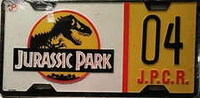 JURASSIC PARK T-REX J.P.C.R.O4 LICENSE PLATE 1993 VINTAGE BRAND NEW, SEALED MINT