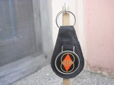 raro portachiavi GILERA in metallo smaltato su base in tessuto - anni '70