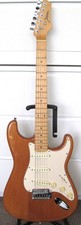 Johnson Stratocaster-style guitar in natural wood and in good condition. 