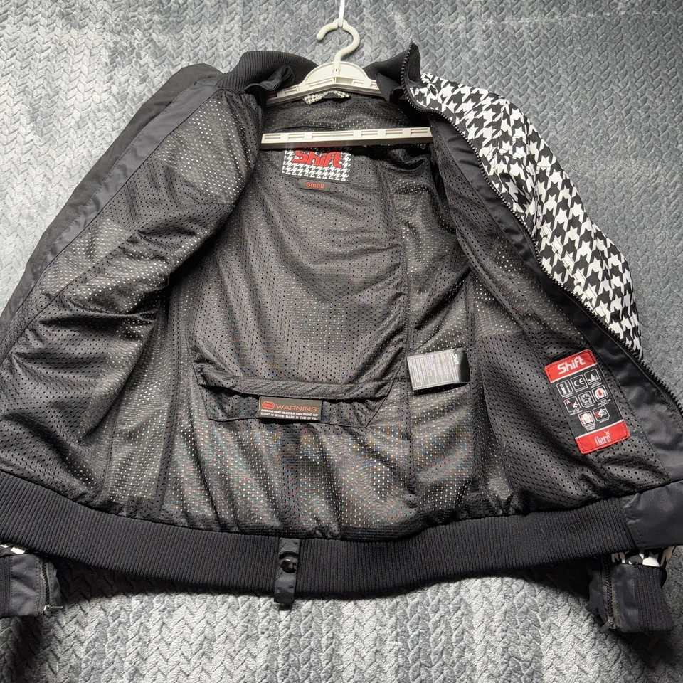 Chaqueta de motocicleta pequeña SHIFT Flare para mujer pata de gallo negra blanca armadura CE Foto 4 de 4