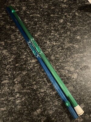 Two Warrior Women s  Lacrosse Shaft Alloy 6000. One Blue One Green.