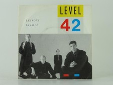 LEVEL 42 LESSONS IN LOVE (1) (63) 2 Track 7" Single including Picture Sleeve POL