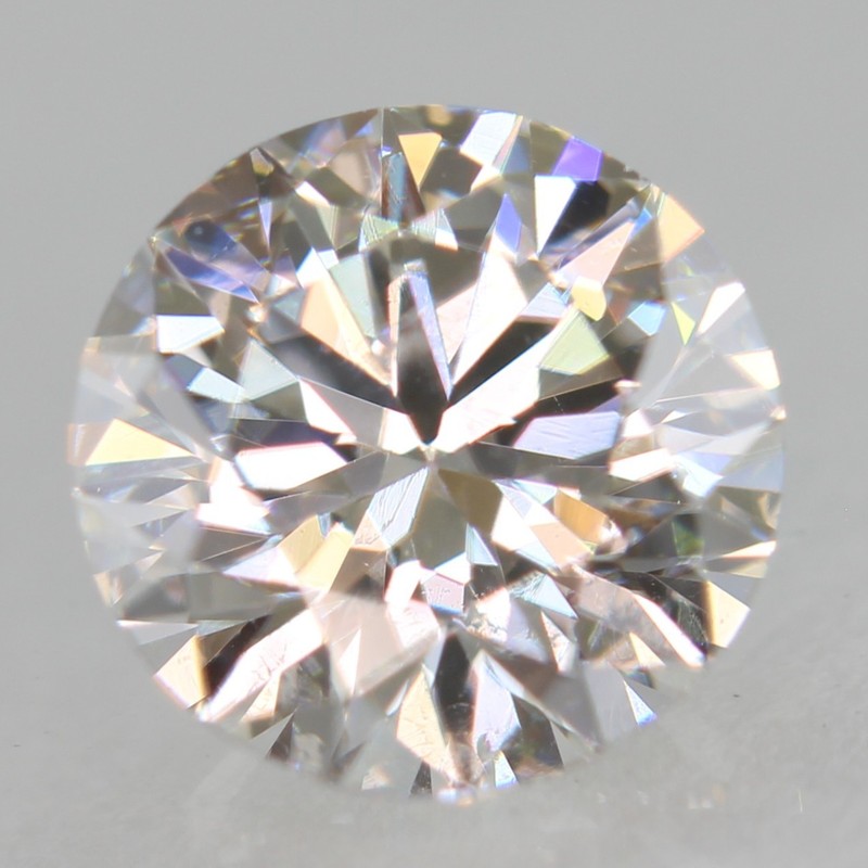 Certified 0.52 Carat E SI1 Round Brilliant Natural Enhanced Loose Diamond 5.19mm