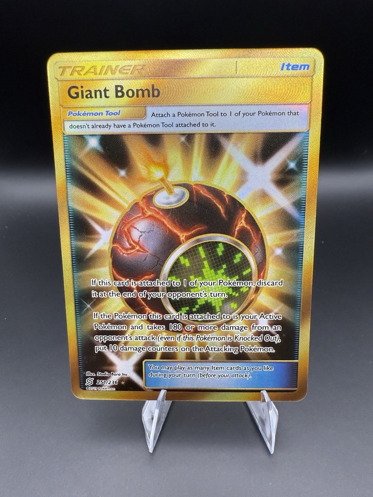 Giant Bomb 251/236 Sm-Unified Minds Holo Card NM Condition
